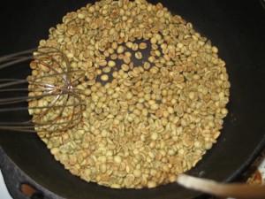 dark green beans while home roasting coffee