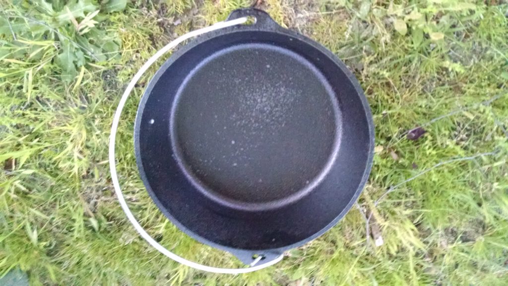 Empty Dutch Oven for strawberry cobbler via dutch oven