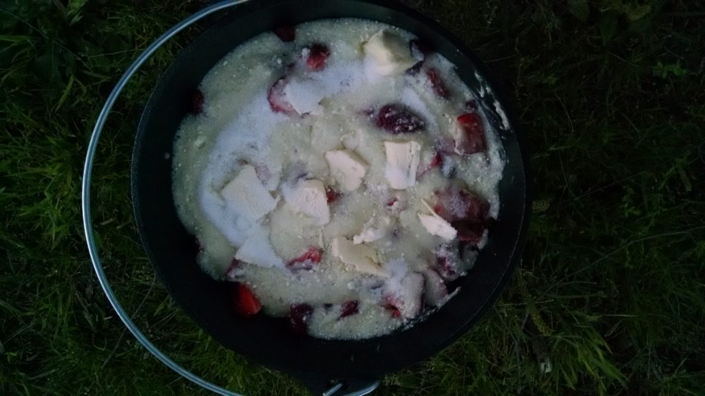 Empty Dutch Oven for strawberry cobbler via dutch oven